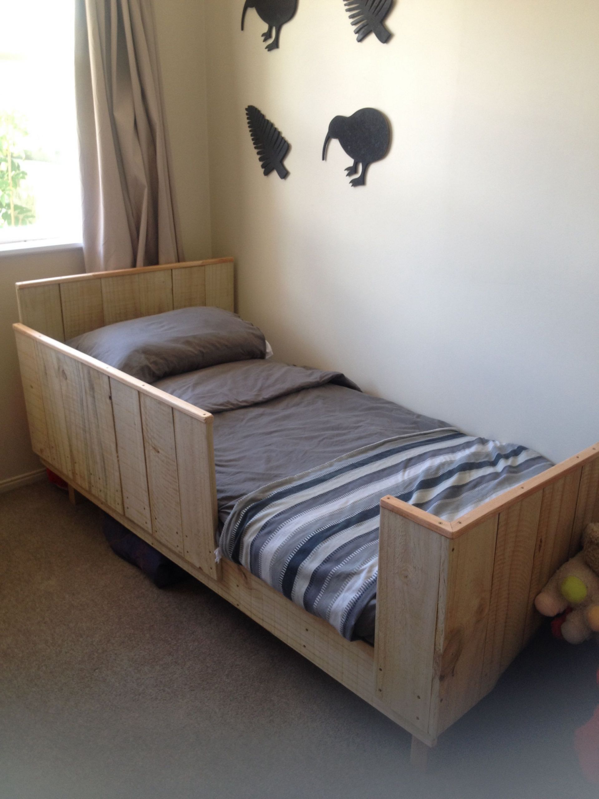 Toddler Bed DIY
 Technically my husband built our toddlers bed out of