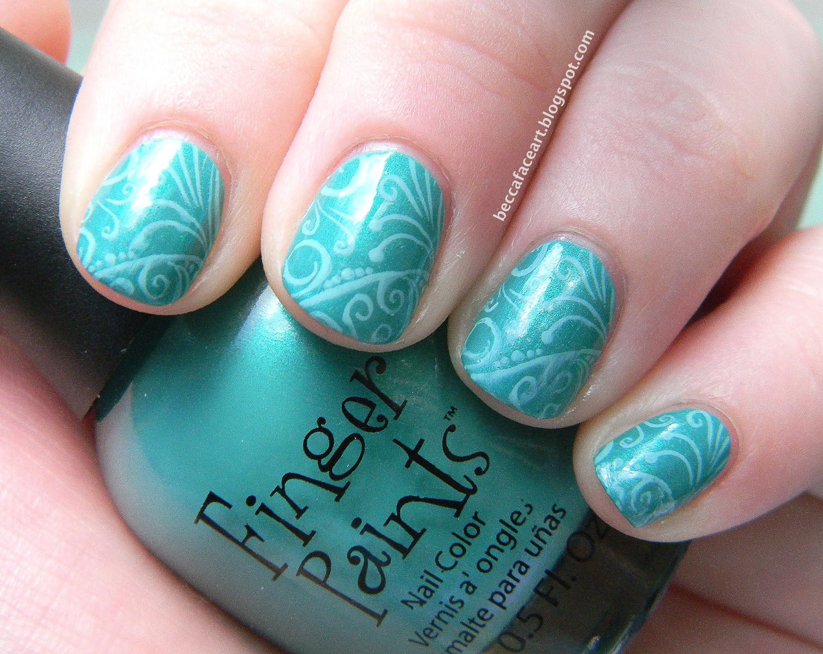 Turquoise Nail Designs
 Becca Face Nail Art Turquoise and Teal Swirl Nails