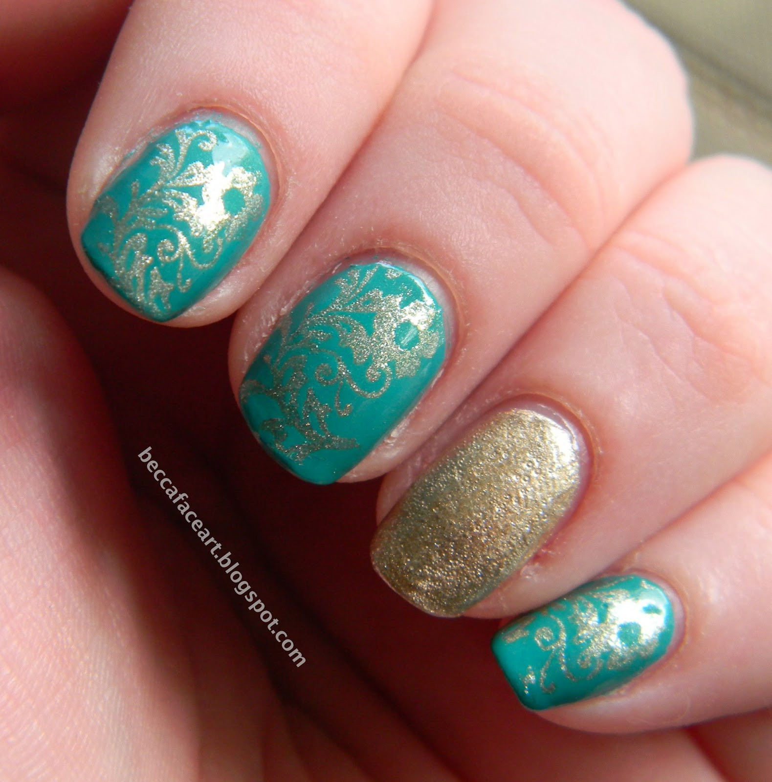 Turquoise Nail Designs
 Becca Face Nail Art Turquoise and Gold Flower Nails