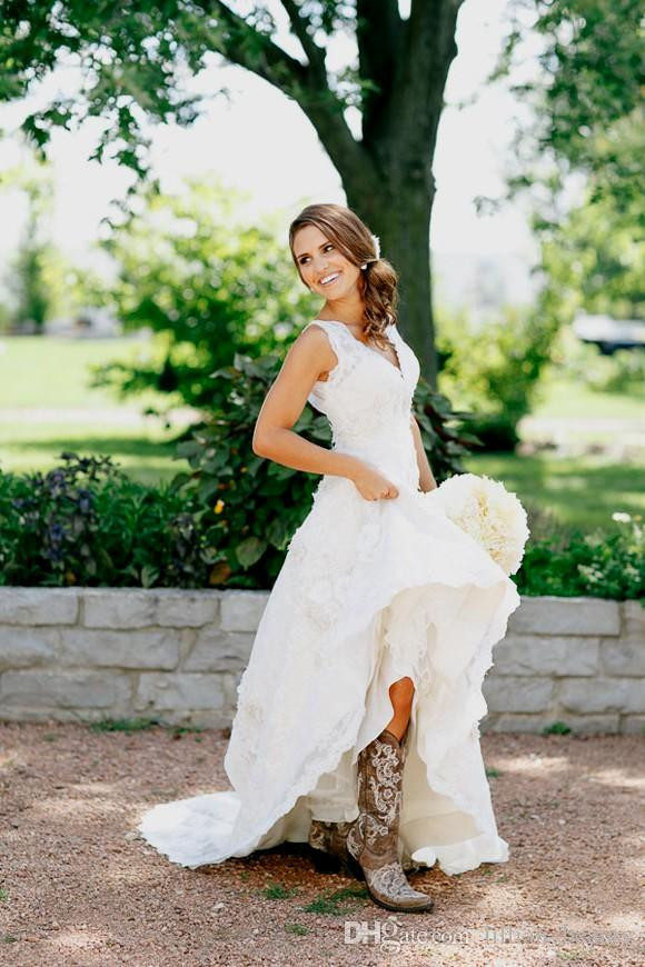 Wedding Dresses With Cowboy Boots
 Discount 2017 Rustic Cowgirl Boots Lace Wedding Dresses