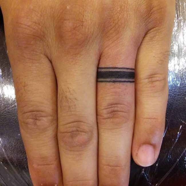 Wedding Ring Tattoos For Men
 60 Hearwarming Wedding Ring Tattoo Ideas The New
