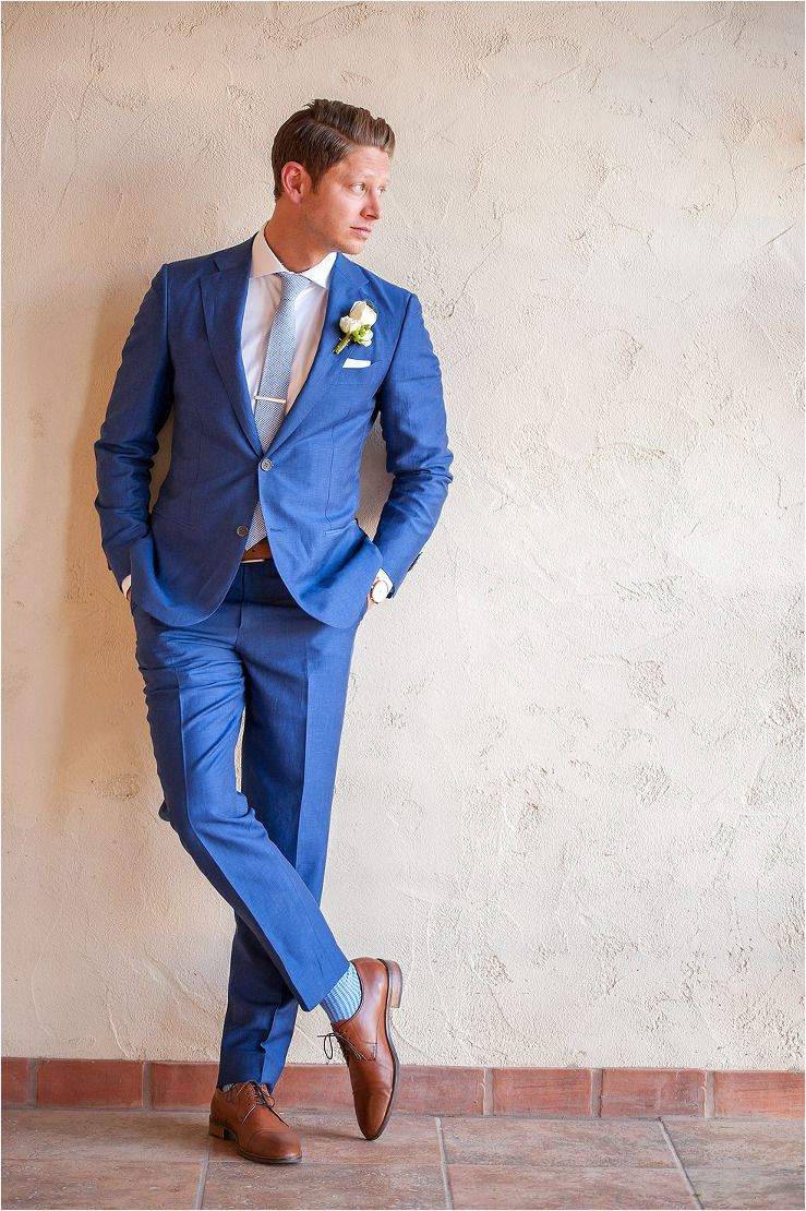 What Color Suit To Wear To A Wedding
 Dapper groom in royal blue suit with saddle color shoes