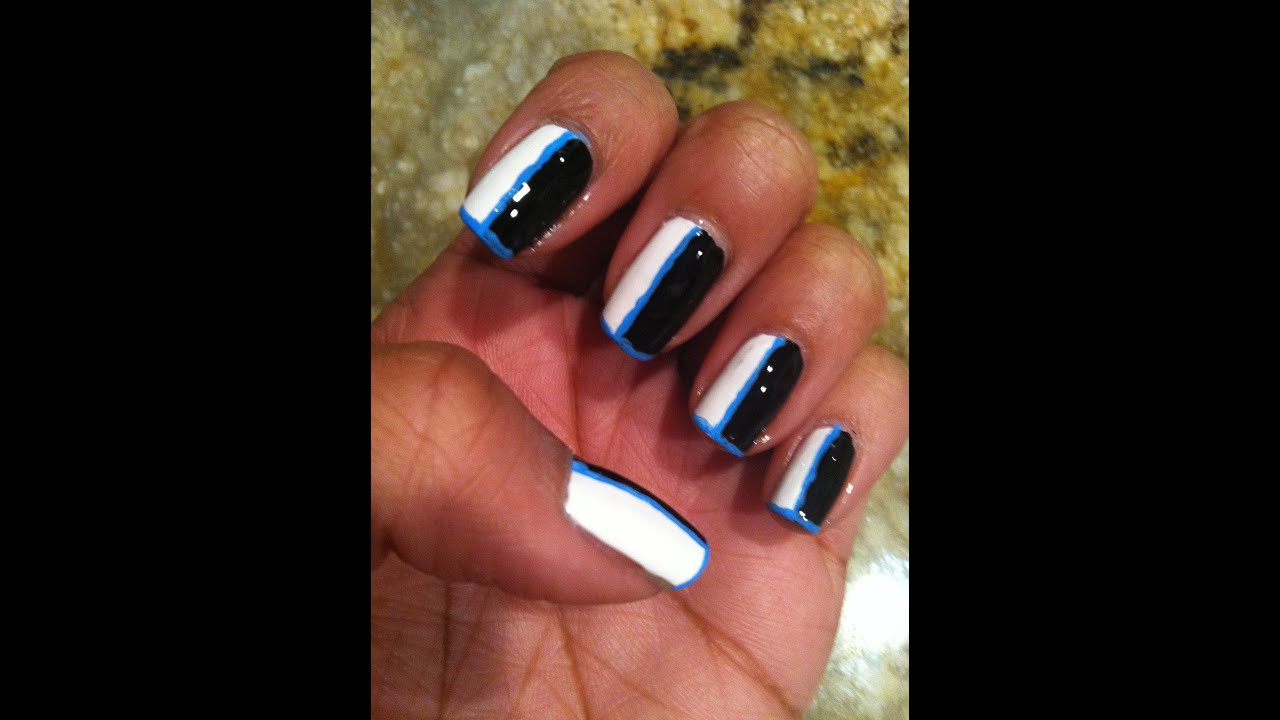 White And Blue Nail Designs
 Black and White nail design w Light Blue Trim