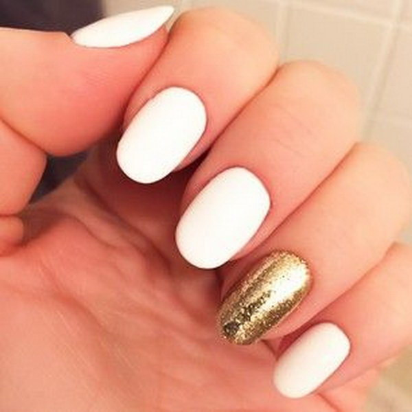 White And Glitter Nails
 35 Elegant and Amazing White and Gold Nail Art Designs