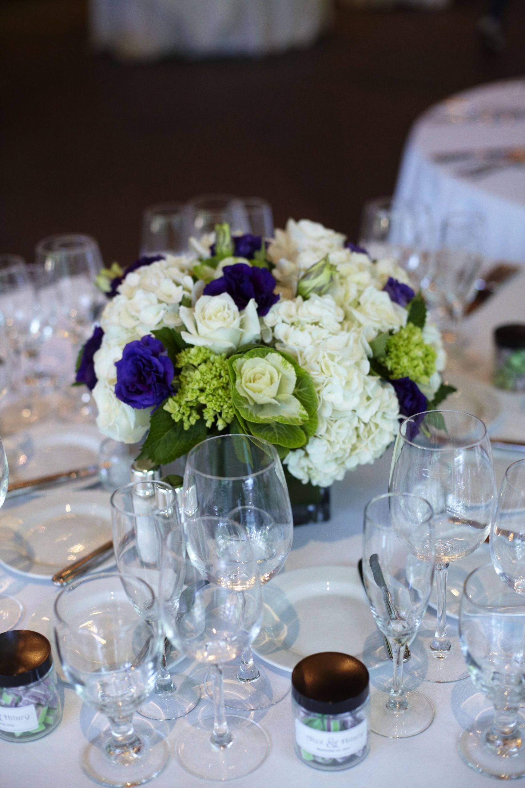White Flower Wedding Centerpieces
 White Purple and Green Low Centerpieces