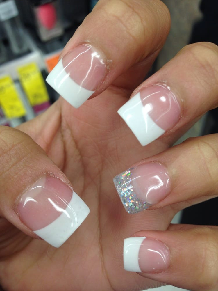 White Tip Nails With Glitter
 White tips with one glitter tip $30 with student discount