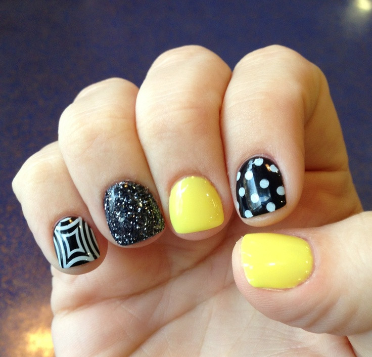 Yellow And Black Nail Art
 17 Best images about Black and yellow nails on Pinterest