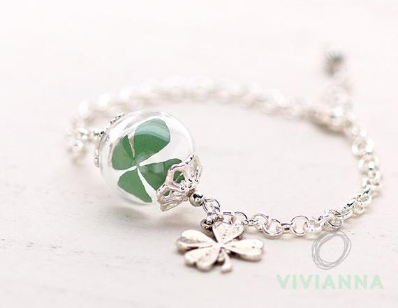 Four Leaf Clover Bracelet
 Bracelet with genuine four leaf clover a033 by Viviannaschmuck