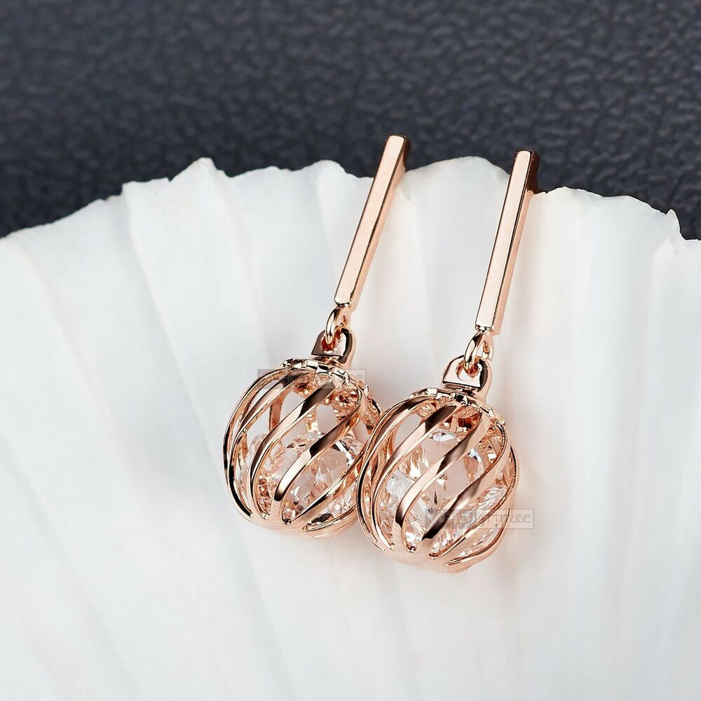 Gold Studs Earrings
 18k rose gold gf made with SWAROVSKI crystal ball filigree