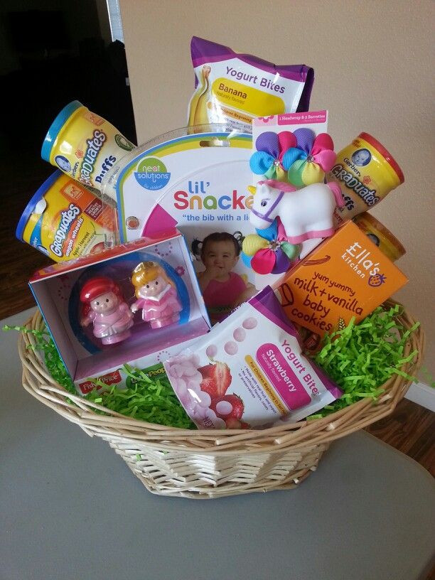 Ideas For Baby Easter Basket
 Baby girls first Easter Basket Full of yummy goo s bib