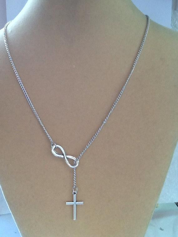 Infinity Lariat Necklace
 Silver cross infinity necklace lariat by PamelaMayCollection