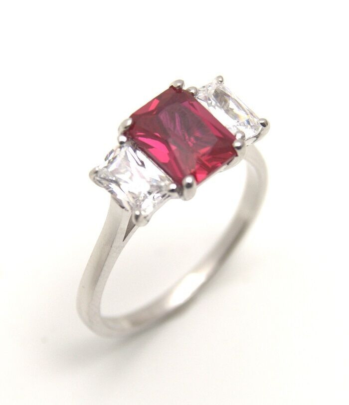 Ruby Diamond Rings
 Diamond Unique Ruby & Diamond 3ct Emerald Cut Trilogy Ring