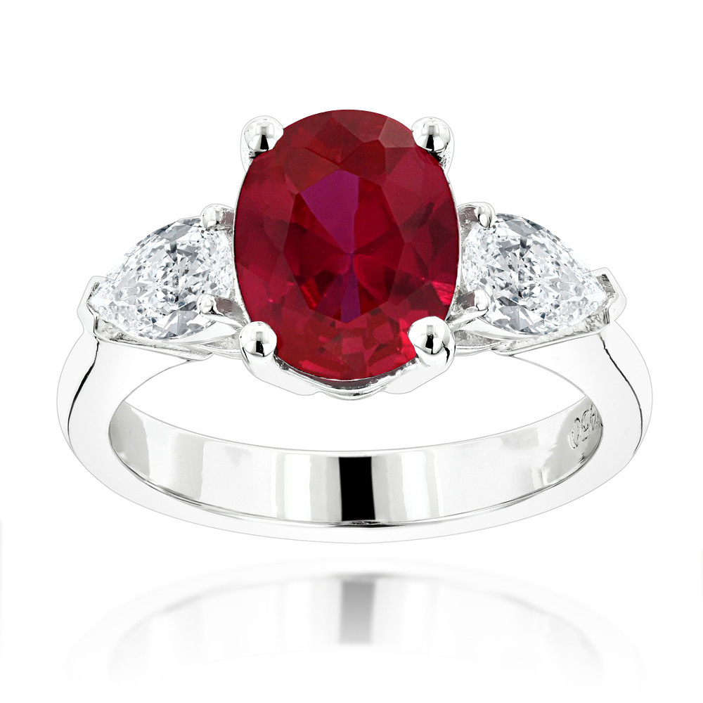 Ruby Diamond Rings
 Unique 3 Stone Platinum Diamond and Ruby Engagement Ring