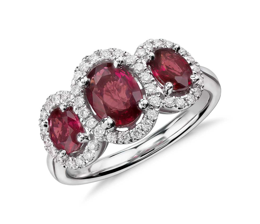 Ruby Diamond Rings
 3 Stone Oval Ruby and Diamond Halo Ring in 18k White Gold