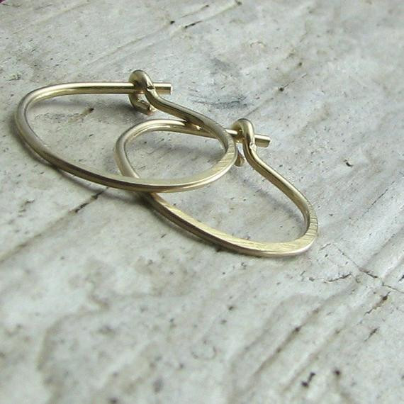 Second Hole Earrings
 Gold filled hoops small second hole earrings by AdroitJewelers