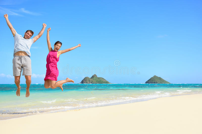 Summer Vacation Ideas Couples
 Happy Fun Tourists Couple Jumping Beach Vacation Stock