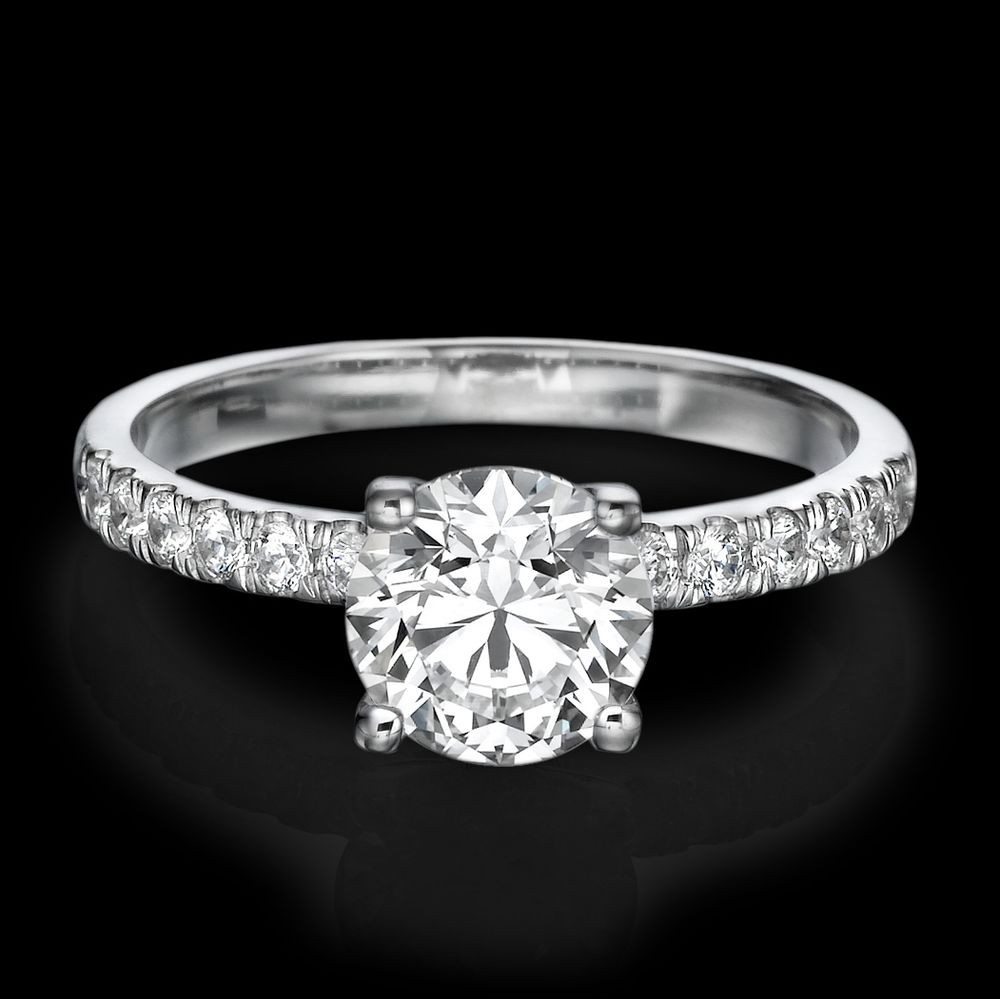 White Diamond Engagement Rings
 1 CARAT D SI1 ENHANCED DIAMOND ENGAGEMENT RING ROUND CUT