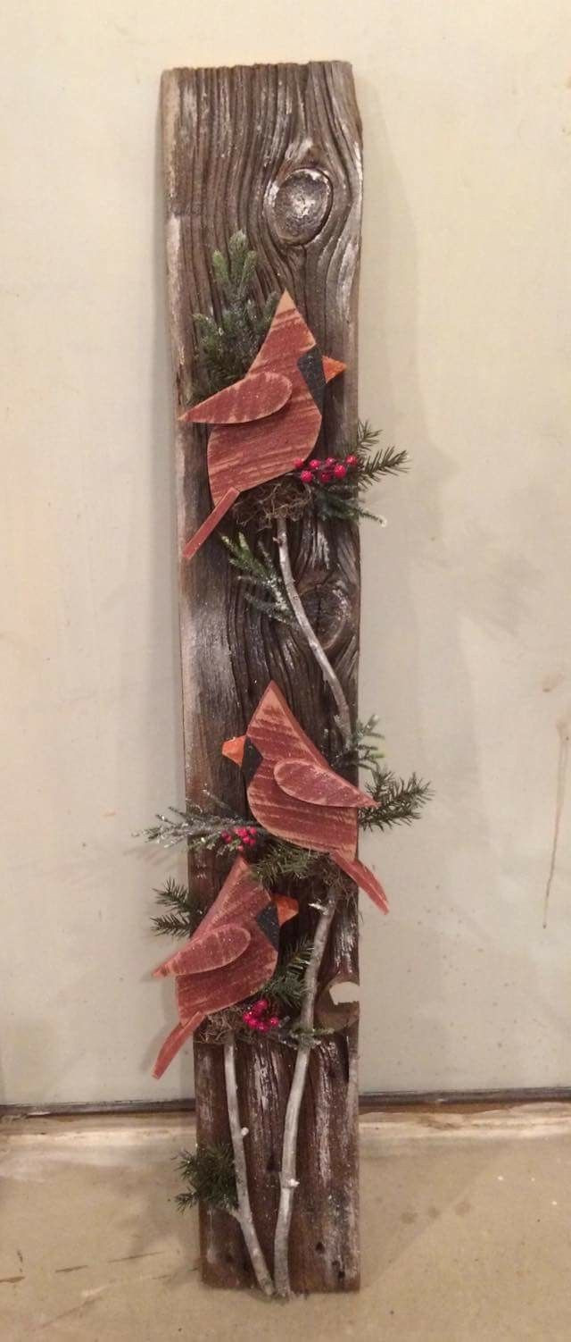 Winter Wood Crafts
 Wooden red birds paper mache vines and leaves on fence